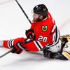 Blackhawks' Saad falls on Bruins' Seidenberg during Game 2 o