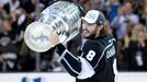 Jun 13, 2014; Los Angeles, CA, USA; Los Angeles Kings defenseman Drew Doughty (8) skates around the rink with the Stanley Cup after defeating the New York Rangers game fi