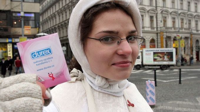 An activist donning a sperm-like outfit offers condoms to passersby on World AIDS Day in Prague