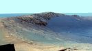 Panorama of 'Santa Maria' Crater for Opportunity's Anniversary (False Color) NASA's Mars Exploration Rover Opportunity is spending the seventh anniversary of its landing on Mars investigating a crater called "Santa Maria," which has a diameter about the length of a football field. This scene looks eastward across the crater. Portions of the rim of a much larger crater, Endurance, appear on the horizon. The panorama spans 125 compass degrees, from north-northwest on the left to south-southwest on the right. It has been assembled from multiple frames taken by the panoramic camera (Pancam) on Opportunity during the 2,453rd and 2,454th Martian days, or sols, of the rover's work on Mars (Dec. 18 and 19, 2010). The view is presented in false color to emphasize differences among materials in the rocks and the soils. It combines images taken through three different Pancam filters admitting light with wavelengths centered at 753 nanometers (near infrared), 535 nanometers (green) and 432 nanometers (violet). Seams have been eliminated from the sky portion of the mosaic to better simulate the vista a person standing on Mars would see. Opportunity landed in the Meridiani Planum region of Mars on Jan. 24, 2004, Universal Time (Jan. 25, Pacific Time) for a mission originally planned to last for three months. Since that prime mission, the rover has continued to work in bonus-time extended missions. Both Opportunity and its twin, Spirit, have made important discoveries about wet environments on ancient Mars that may have been favorable for supporting microbial life. By mid-January 2011, Opportunity reached a location at the southeastern edge of Santa Maria crater. The rover team developed plans for Opportunity to spend a few weeks investigating rocks at that site during solar conjunction, a period when communications between Earth and Mars are curtailed because the sun is almost directly between the two planets. After completion of its work at Santa Maria, the rover will resume a long-term trek toward Endeavour. Image Credit: NASA/JPL-Caltech/Cornell/ASU