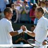Jarkko Nieminen of Finland shakes hands with Lleyton Hewitt of Australia after winning their match at the Wimbledon Tennis Championships in London