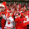 Canadian fans cheer during play between Canada and the Czech Republic during the first period of their IIHF World Junior Championship ice hockey game in Malmo