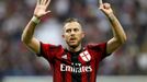 AC Milan's Menez celebrates the team's third goal against Lazio during their Italian Serie A soccer match in Milan