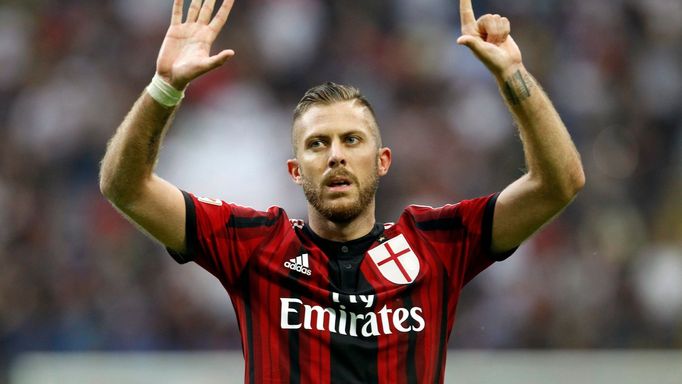 AC Milan's Menez celebrates the team's third goal against Lazio during their Italian Serie A soccer match in Milan