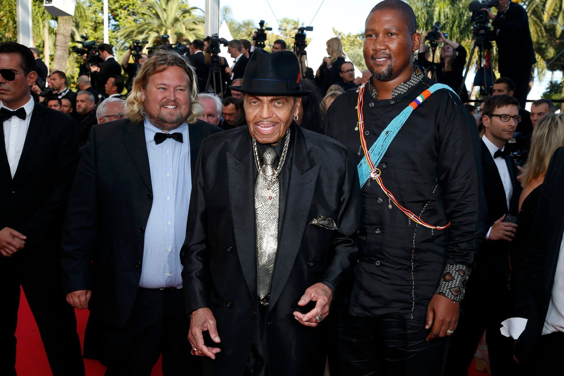 Joe Jackson, father of the late pop star Michael Jackson, and Mandla Mandela arrive with guests for the screening of the film &quot;Sils Maria&quot; in competition at the 67th Cannes Film Festival in