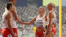 Athletics - World Athletics Championships - Doha 2019 - Mixed 4x400 Metres Relay Final - Khalifa International Stadium, Doha, Qatar - September 29, 2019 Team Poland react