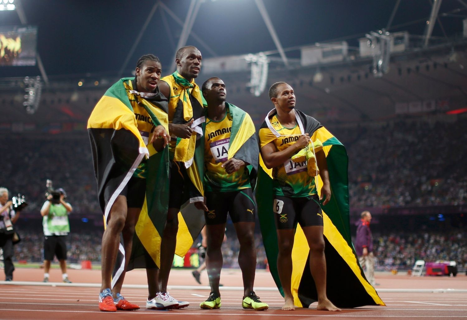 Jamajský štafetový tým sprinterů na 4x100 metrů slaví zlato a světový rekord na OH 2012 v Londýně.