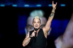 Robbie Williams na Szigetu flirtoval a zpíval hit za hitem