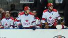 Hokejisté CSKA Moskva Michail Grabovskij, Alexandr Radulov a Igor Radulov vstávají v utkání KHL 2012/13 proti Lvu Praha.