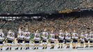 Jan 1, 2020; Dallas, TX, USA; Nashville Predators players stand for the national anthem before the 2020 Winter Classic hockey game against the Dallas Stars at Cotton Bowl