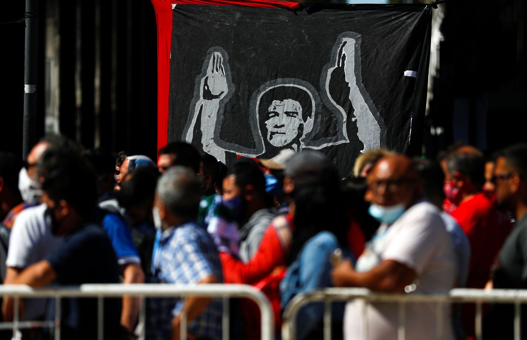 Banner depicting late soccer legend Diego Maradona is pictured outside the Casa Rosada presidential palace, in Buenos Aires