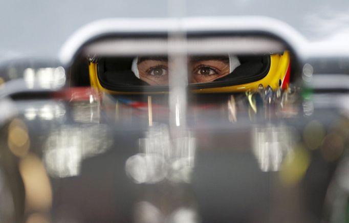 McLaren F1 driver Fernando Alonso sits in his car during the first practice session at the Australian Formula One Grand Prix in Melbourne.