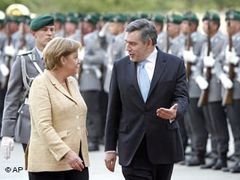 Gordon Brown s Angelou Merkelovou.