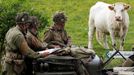 Few days before the 75th anniversary of the allied landings on D-Day, history enthusiasts read a map on a vintage jeep during a re-enactment of D-Day landings