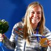 Gold medalist Jamie Anderson of the U.S. poses on the podium at the medal ceremony after the women's snowboard slopestyle event at the