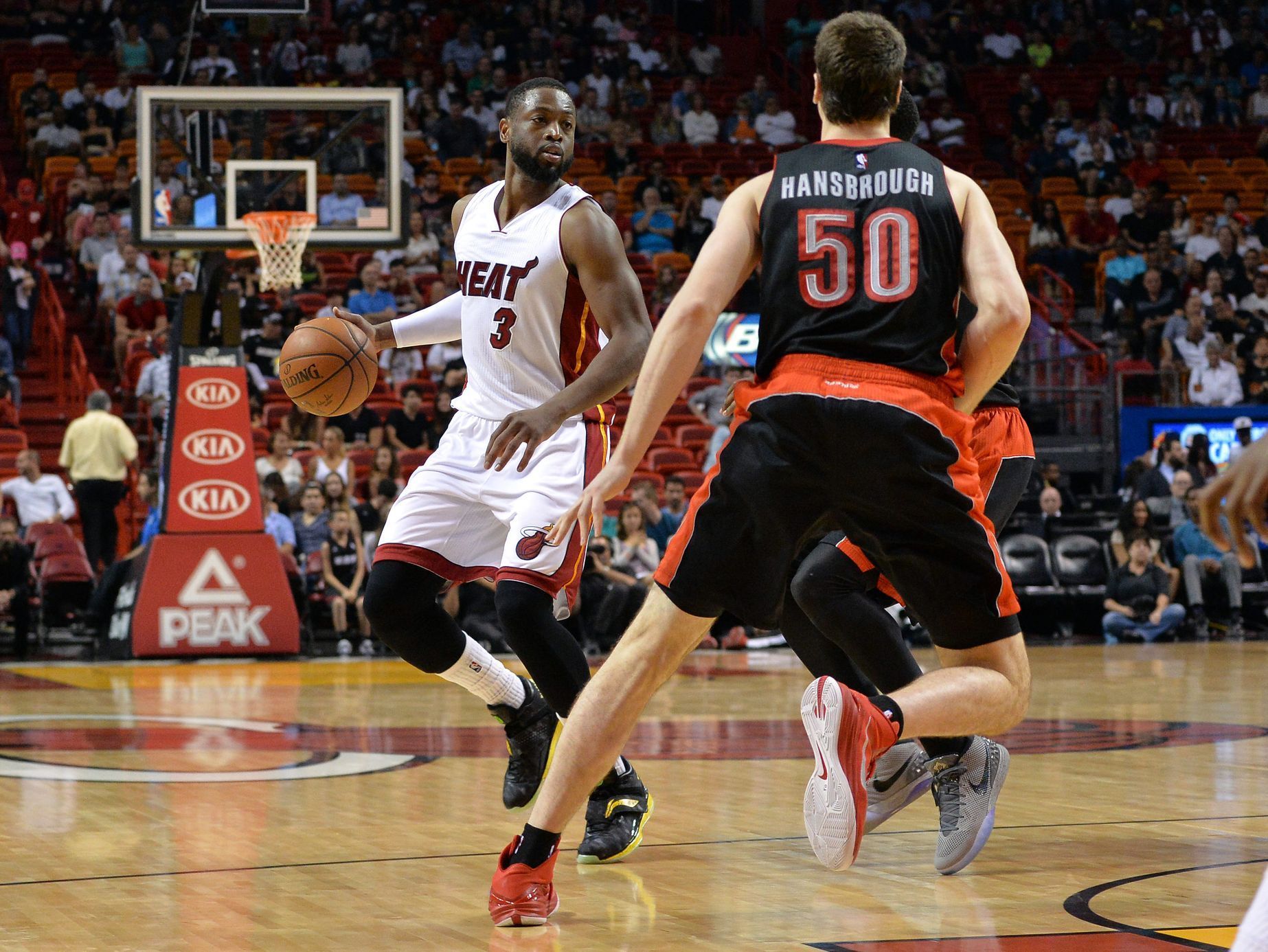 NBA: Toronto Raptors at Miami Heat (Wade, Hansbrough)