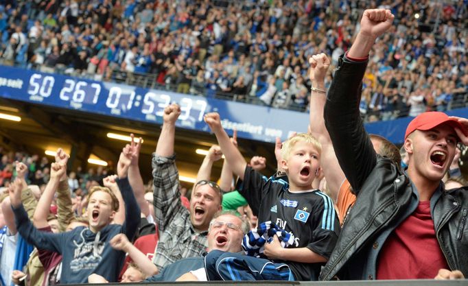 Soccer fans of German first division team Hamburg SV celebrate after the second leg Bundesliga relegation match against Greuther Fuerth