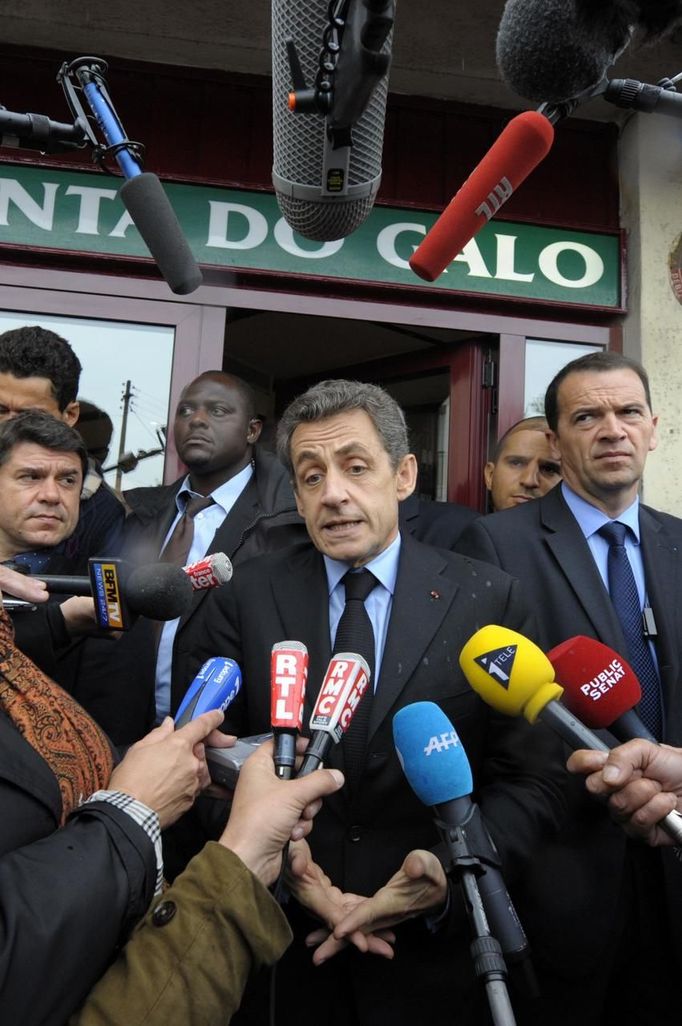 Sarkozy, France's President and UMP candidate for the 2012 French presidential election, speaks to the media in Drancy