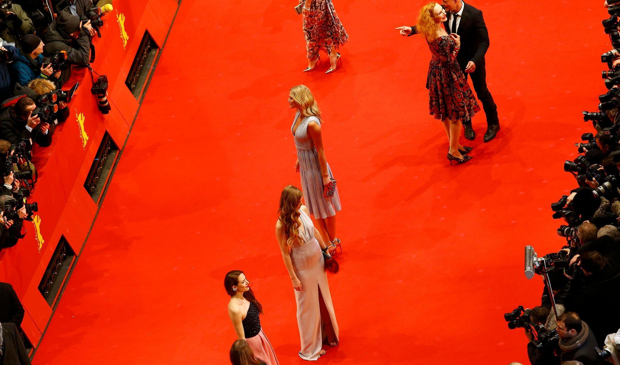 Model Garrn arrives with other guests on the red carpet for the screening of the movie 'Nobody Wants the Night', during the opening gala of the 65th Berlinale International Film Festival, in Berlin