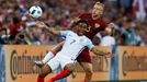 England's Raheem Sterling in action with Russia's Igor Smolnikov