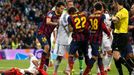 Barcelona's Busquets steps on Real Madrid's Pepe after a Messi goal against Real Madrid during La Liga's second 'Clasico' soccer match of the season in Madrid