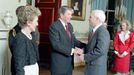 President Ronald Reagan and Mrs. Nancy Reagan greet John McCain in the White House Blue Room during a dinner for newly elected members of the 100th Congress. 1987.