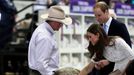 Britain's Catherine, Duchess of Cambridge, strokes Fred the ram at the Royal Easter Show in Sydney