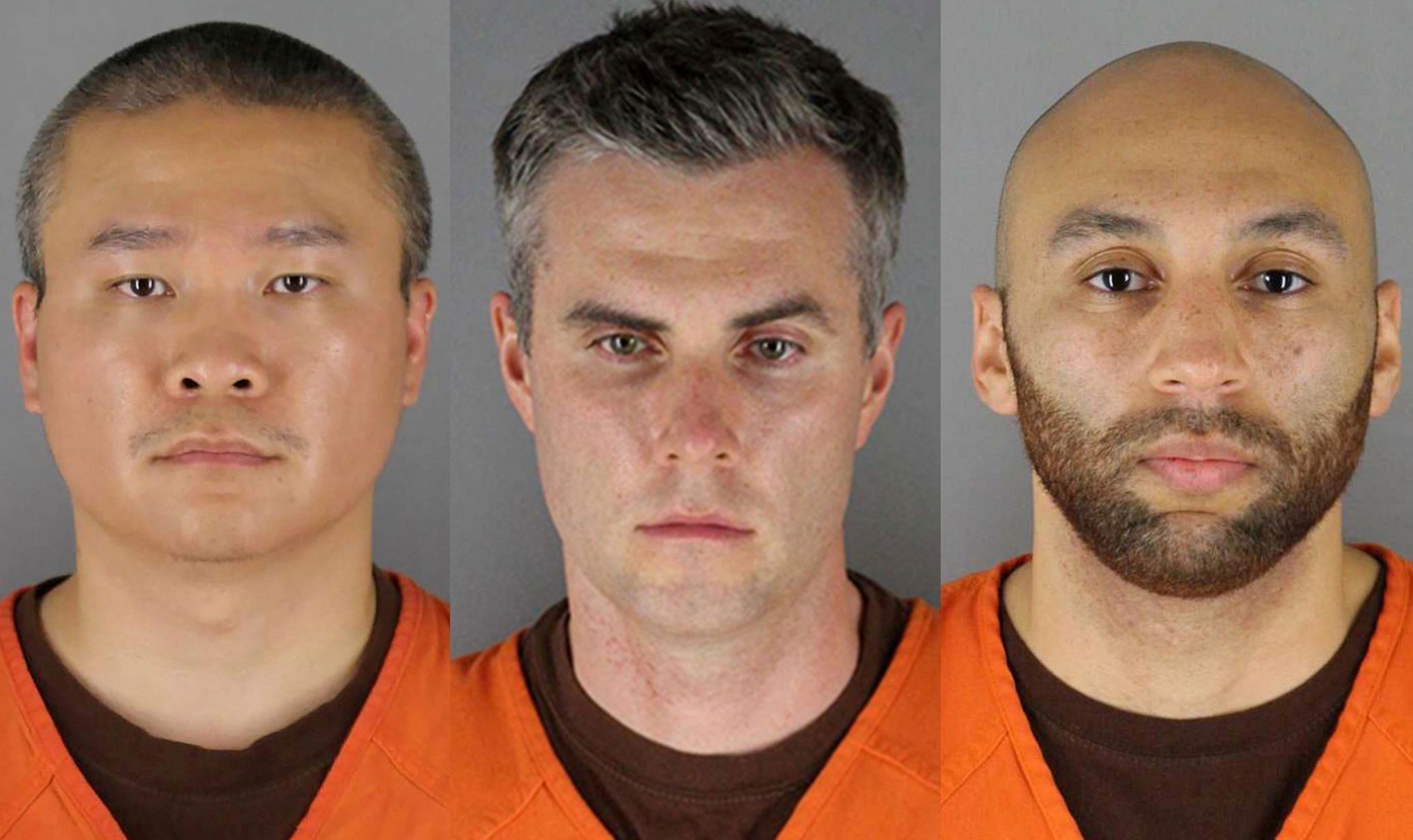 Trojice bývlých policistů z Minneapolis, obviněných kvůli smrti George Floyda. Thomas Lane je uprostřed