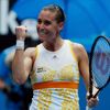 Flavia Pennetta of Italy celebrates defeating Monica Puig of Puerto Rico in their women's singles match at the Australian Open 2014 tennis tournament in Melbourne