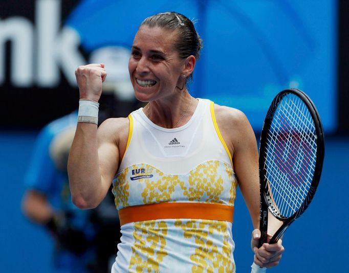 Flavia Pennetta of Italy celebrates defeating Monica Puig of Puerto Rico in their women's singles match at the Australian Open 2014 tennis tournament in Melbourne January