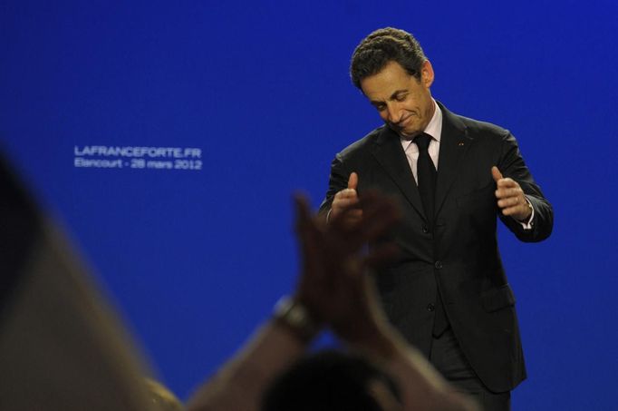 France's President and UMP party candidate for the 2012 French presidential elections Sarkozy delivers a speech at a political rally in Elancourt, near Paris