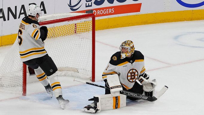 Dec 19, 2024; Edmonton, Alberta, CAN; Edmonton Oilers defensemen Mattias Ekholm (14) scores the winning goal in overtime against the Boston Bruins at Rogers Place. Mandat