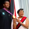 Vítání olympijského šampiona Keshorna Walcotta (Trinidad a Tobago)
