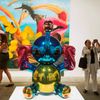 Attendees during a press preview before the opening of a Jeff Koons retrospective at the Whitney Museum of American Art in New York