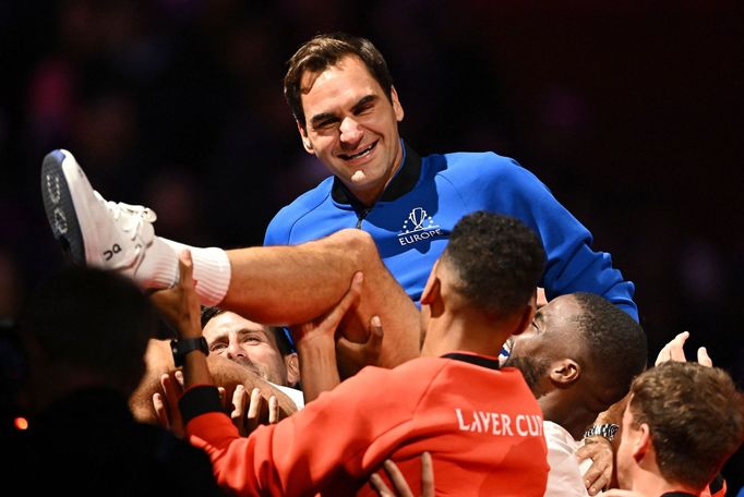 Tennis - Laver Cup - 02 Arena, London, Britain - September 24, 2022  Team Europe and World members lift Roger Federer at the end of his last match after announcing his re