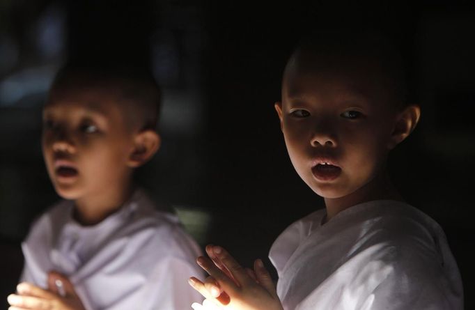 Novice Thai nuns pray at the Sathira Dammasathan Buddhist meditation centre in Bangkok