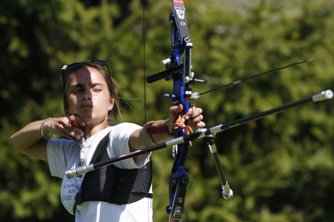 Olympic hopeful and member of the U.S. archery team Gibilaro practises in Branford