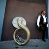 Mariachi musician Moises Rivera waits for a gig in the Boyle Heights area of Los Angeles