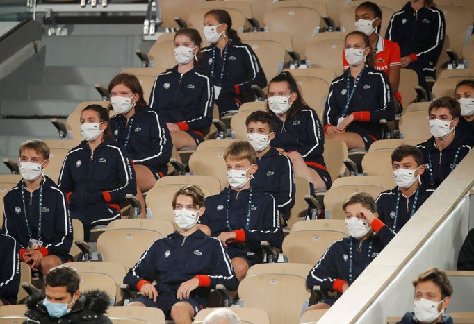 Tennis - French Open - Roland Garros, Paris, France - October 9, 2020 Ball boys and girls are seen in the stands REUTERS/Charles Platiau