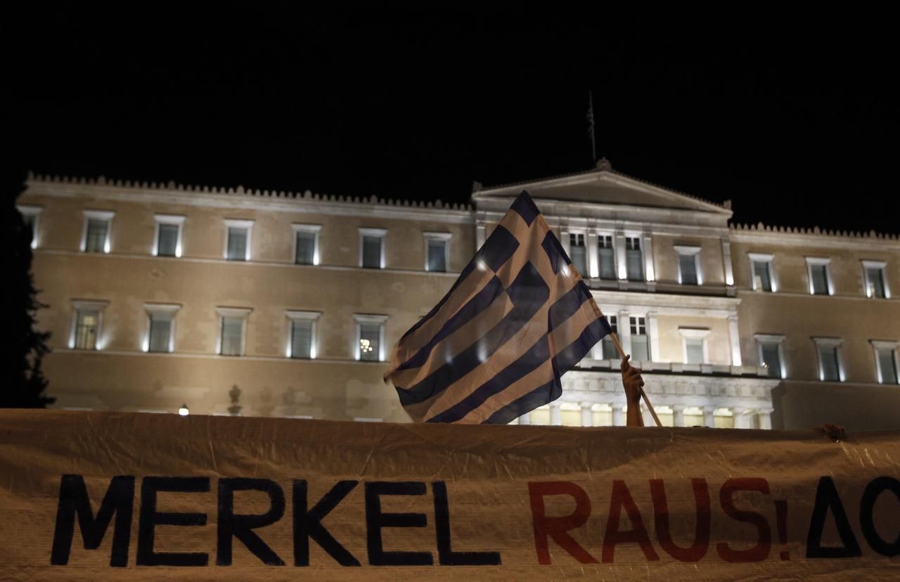 Protesty v Řečku - Merkelová
