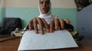 A blind Afghan student reads Braille during a lesson at a blind school in Kabul September 4, 2012. The vocational blind school, which is the only blind school in Afghanistan, was established in 1977 and has more than 187 students including boys and girls. Picture taken September 4, 2012. REUTERS/Omar Sobhani (AFGHANISTAN - Tags: SOCIETY EDUCATION) Published: Zář. 6, 2012, 6:26 dop.