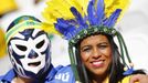 Brazilian fans poss before the 2014 World Cup opening match between Brazil and Croatia at the Corinthians arena in Sai Paulo June 12,2014. REUTERS/Kai Pfaffenbach (BRAZIL