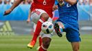 Wales' Ashley Williams in action with Slovakia's Michal Duris