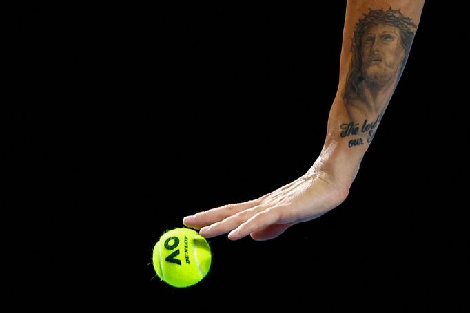 Tennis - Australian Open - Melbourne Park, Melbourne, Australia - January 16, 2024 A tattoo on the arm of Britain's Dan Evans is pictured during his first round match aga