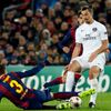 Paris St Germain's Zlatan Ibrahimovic is challenged by Barcelona's Gerard Pique during their Champions League Group F soccer match at the Nou Camp stadium in Barcelona