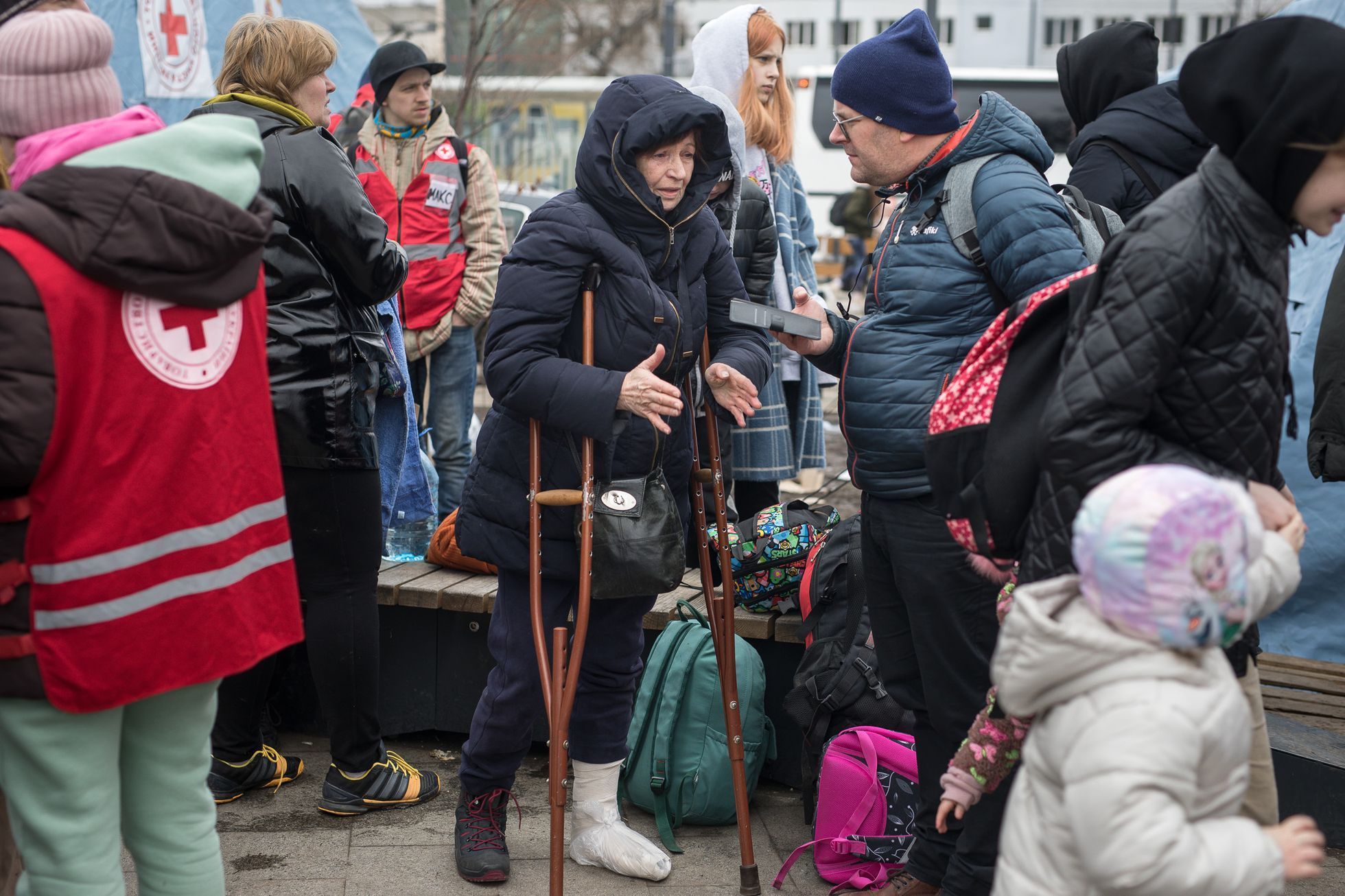 Válka na Ukrajině - nádraží Lvov, uprchlíci, děti, ukrajinci, humanitární krize