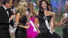 Miss Photogenic winner Miss Indiana USA Reece reacts on stage during the 2015 Miss USA beauty pageant in Baton Rouge, Louisiana