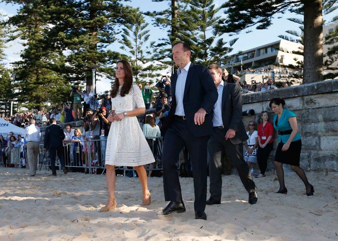 Catherine, the Duchess of Cambridge, arrives at a surf lifesaving demonstration with Australian Prime Minister Tony Abbott at Sydney's Manly beach