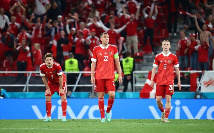 Soccer Football - Euro 2020 - Group B - Russia v Denmark - Parken Stadium, Copenhagen, Denmark - June 21, 2021 Russia's Artem Dzyuba,  Maksim Mukhin and Igor Diveyev look