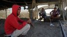 6 Titulek: Gaza's tunnel mugglers on Egypt border idle Popis: Palestinian workers rest outside a smuggling tunnel in Rafah, on the border between Egypt and the southern Gaza, October 8, 2013. Gaza's tunnel smugglers along the border with Egypt are mostly idle these days. Since the summer, Egypt's military has tried to destroy or seal off most of the smuggling tunnels under the Gaza-Egypt border, a consequence of the heightened tensions between Cairo and the Hamas government in Gaza which is suffering a bad economic recession.